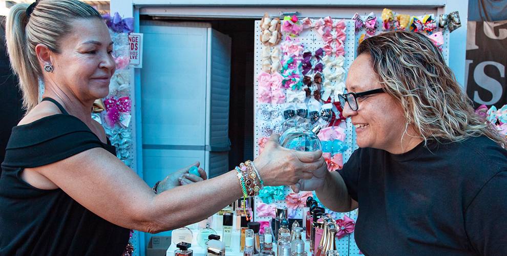 Two women looking at jewelry